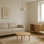 Minimalist living room in a compact home with neutral colors, clean lines, natural light, and simple modern furniture.